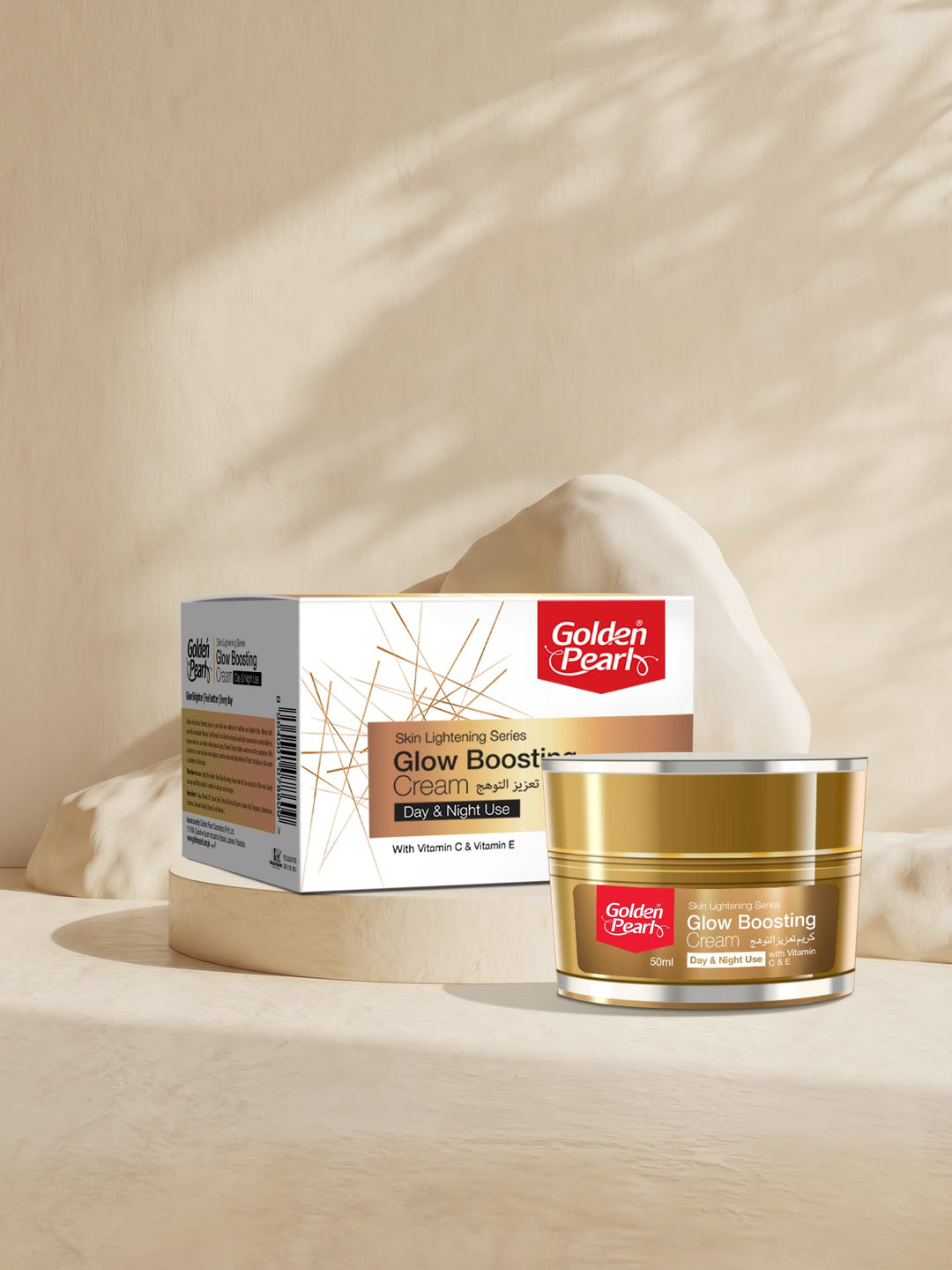 Golden Pearl Glow Boosting Cream packaging on a beige background