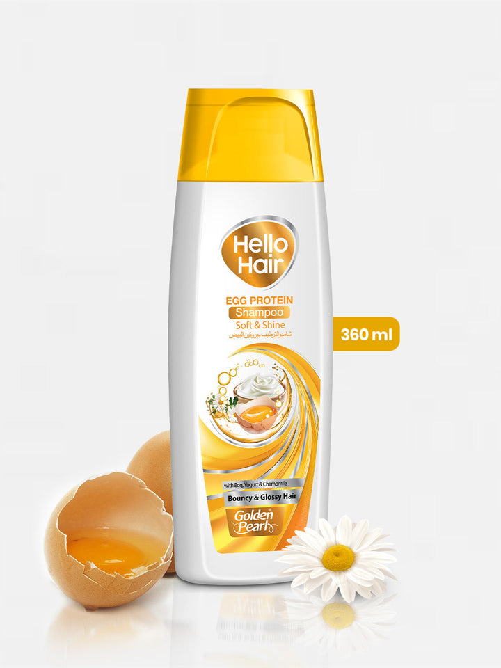 Hello Hair shampoo bottle with egg and flower on a white background