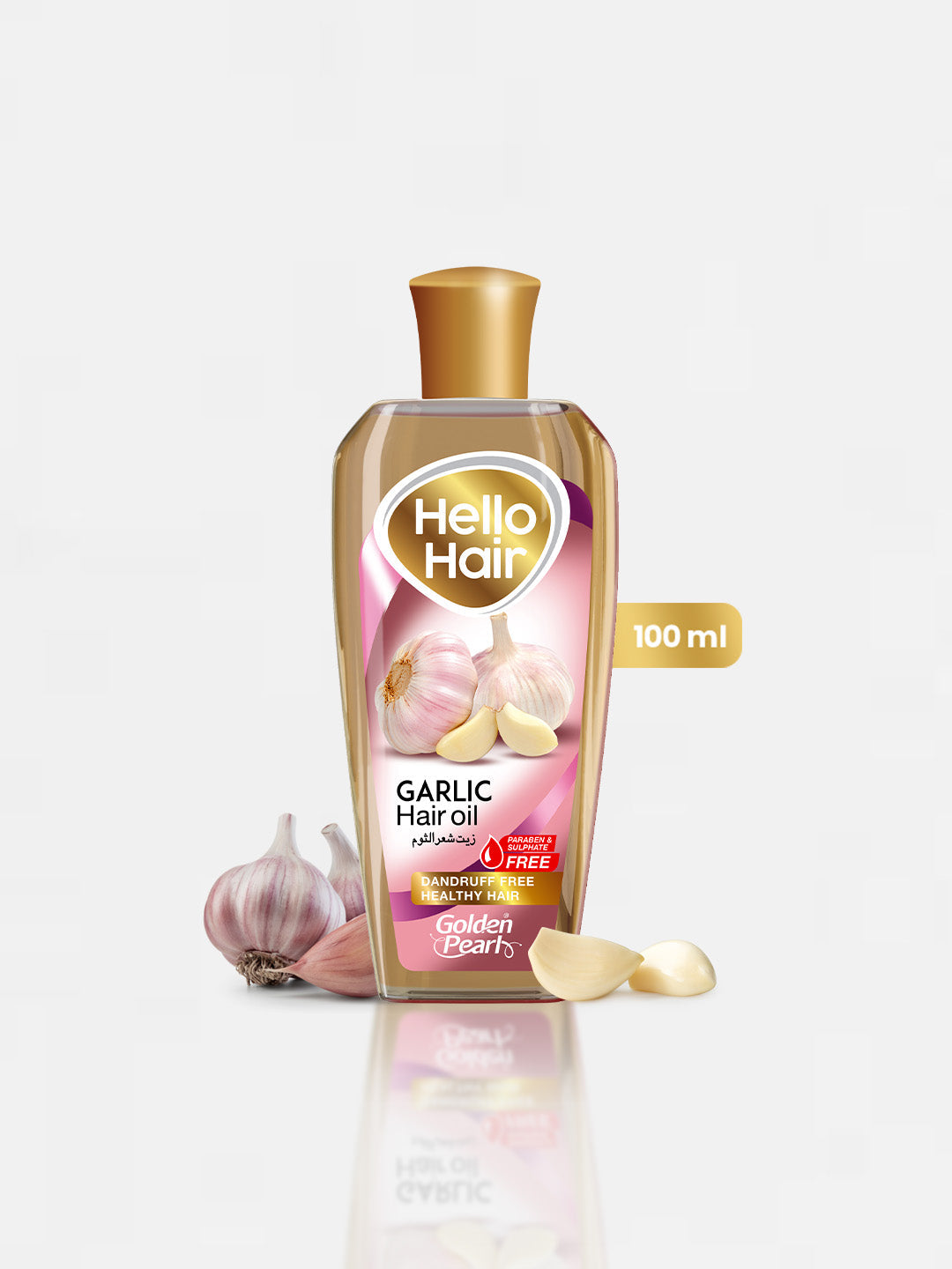Hello Hair Garlic Hair Oil bottle with garlic cloves on a white background