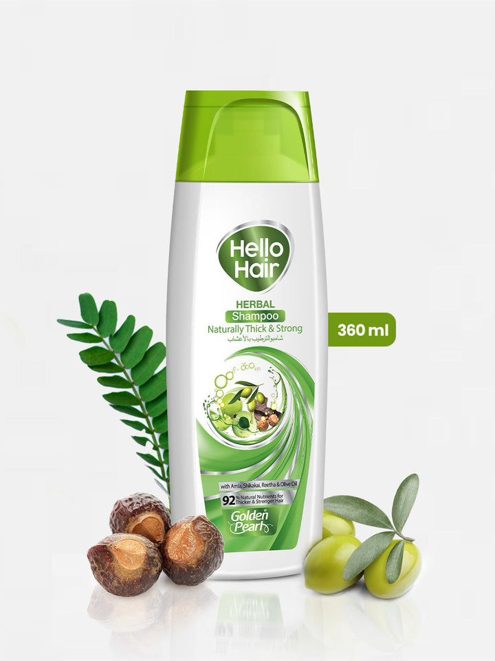 Hello Hair Herbal Shampoo bottle with green cap and leaves on a white background