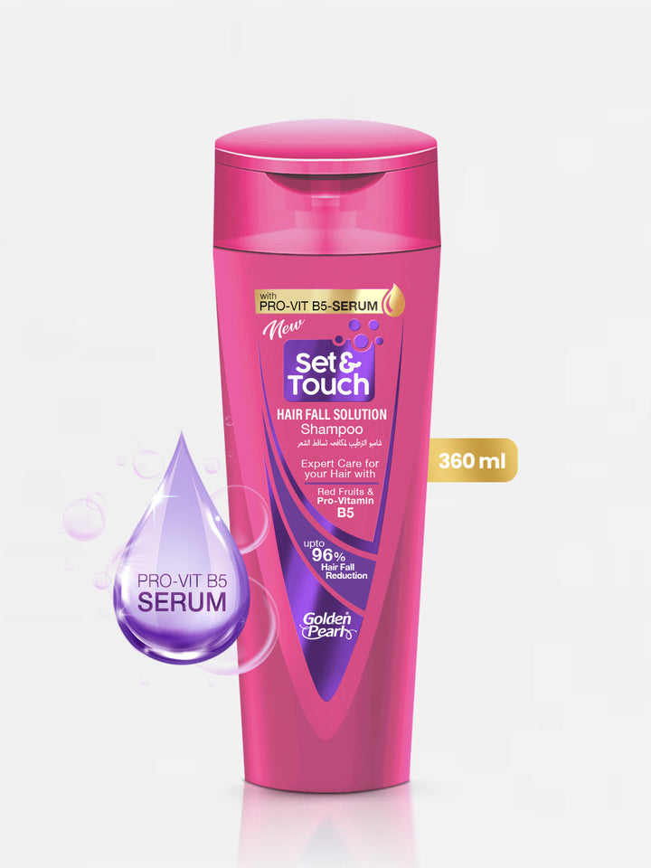 Pink shampoo bottle with purple droplet on a white background